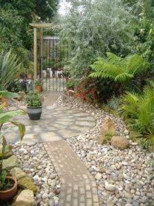 Garden Design With Stones Sea Buckthorn, Tropical Mix With Succulents In Driftwood Picture 156