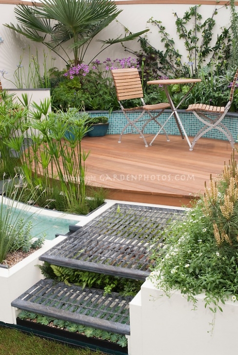 Landscaping Around Raised Deck Circular Raised Patio And Plantings | Plant &amp; Flower Stock Image 479