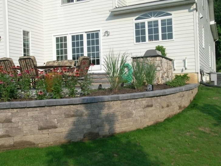 Landscaping Around Raised Deck The Retaining Walls For This Raised Patio Create Beautiful Image 924
