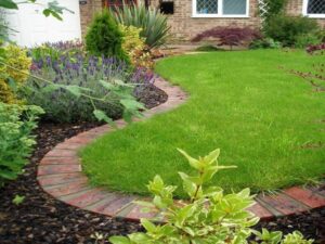 Metal Flower Bed Borders Brick Pavers Cemented Together To Form An "Impenetrable Picture 855