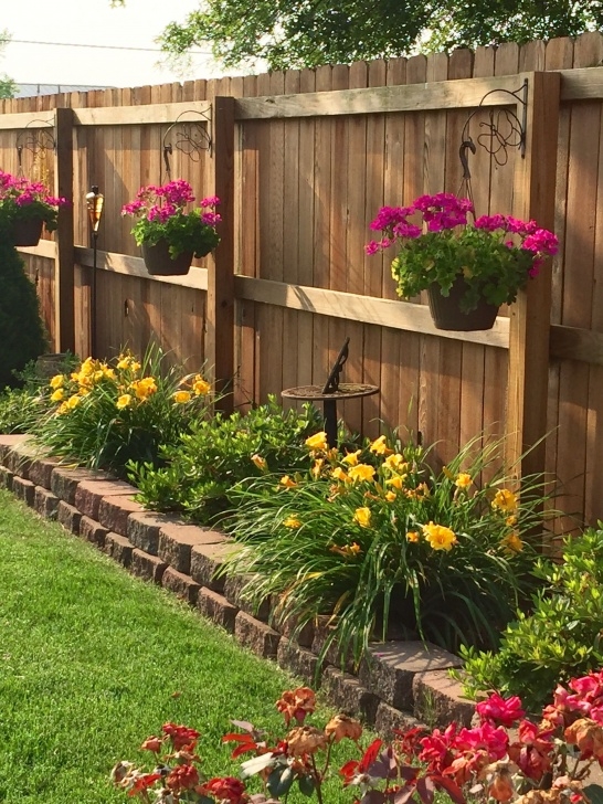 Small Fencing For Flower Beds Bring The Flowers High With Hanging Baskets | Backyard Picture 802