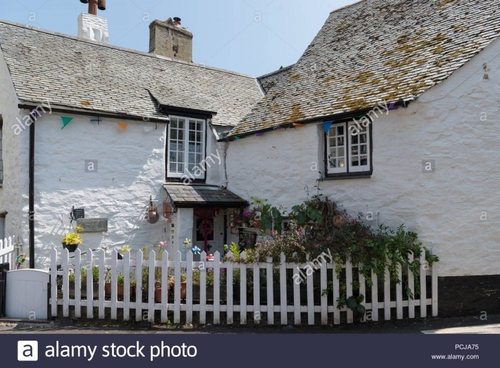 Small White Garden Fence A Quaint Whitewashed Cottage With A Small Garden Bounded Picture 448